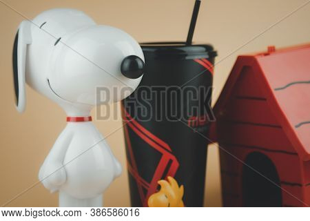 Samut Prakan, Thailand - September 23, 2020 : Close Up Of Snoopy Plastic Drink Cup And Woodstock Pop