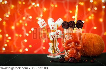 Banner. Glass Mug Skull With Red Tomato Juice. A Cocktail At A Halloween Party. Marshmello Scary Fac