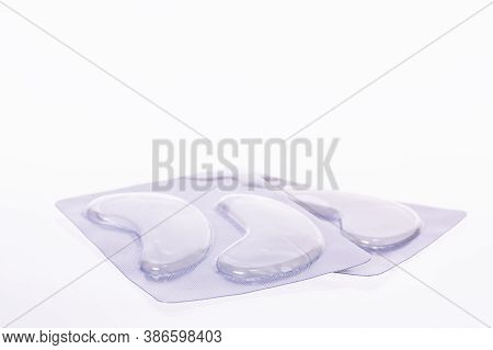 Hydrating Under Eye Gel Patches In Silver No Name Packaging Isolated On White Background. Quick Skin