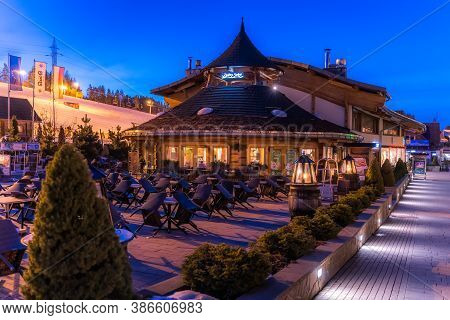 Bialka Tatrzanska, Poland, March 2019 Restaurants And Shopping Area In Ski Lift Bania At Night Time.