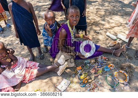Engare Sero. Tanzania - January 2020: Indigenous Maasai In Traditional Village. Maasailand Is The Ar