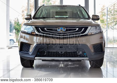 Russia, Izhevsk - August 14, 2020: New Modern Emgrand X7 In The Geely Showroom. Front View.