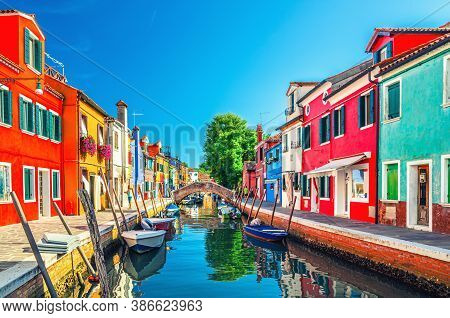 Colorful Houses Of Burano Island. Multicolored Buildings On Fondamenta Embankment Of Narrow Water Ca