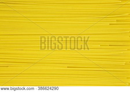 The Concept Of A Healthy Diet. The Background Is Spaghetti. Pasta From Hard Wheat Varieties Are Allo