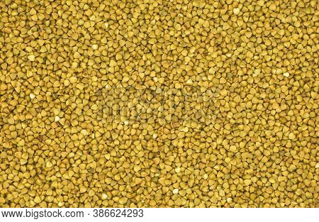 The Concept Of A Healthy Diet. The Background Is Made Of Buckwheat. Buckwheat Is The Most Important