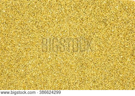 The Concept Of A Healthy Diet. The Background Is Made Of Wheat Groats. Wheat Grit Is The Most Import