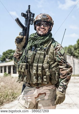 Army Soldier, Special Forces Infantryman, Navy Seals Fighter In Camouflage Uniform, Combat Helmet An