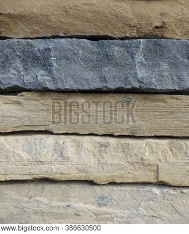 Background With A Stone Wall In Blue, Brown And Beige Colors, Stone Texture