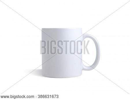 Simple White Mug With Shadow On A White Background Isolated