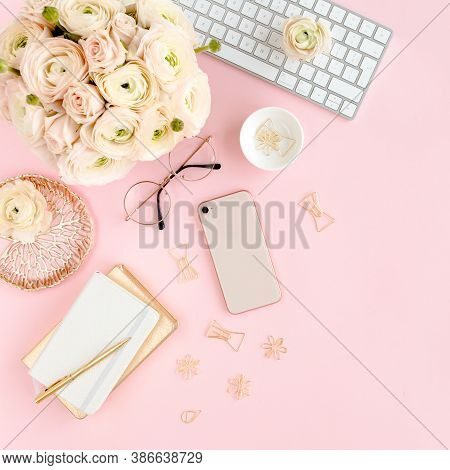 Stylized, Pink Womens Home Office Desk. Workspace With Computer, Bouquet Ranunculus And Roses, Phone