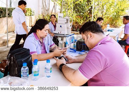 Kanchanaburi Thailand - December 14 : A Mobile Hospital Unit For Eye Examination Services For The Ge