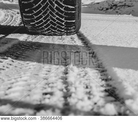 Snow On Street - Winter Tires On Car On Street