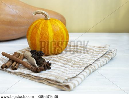 Small Pumpkins On White Wooden Background. Autmn Composition, Thanksgiving Day Concept. Halloween Fl