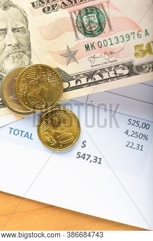 Invoice Bill, Dollar And Euro Money Banknotes Coints On Table, Accounting Concept