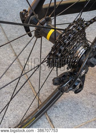 Close View On A  Wheal Of Racing Bicycle With Cogset Cassete Installed