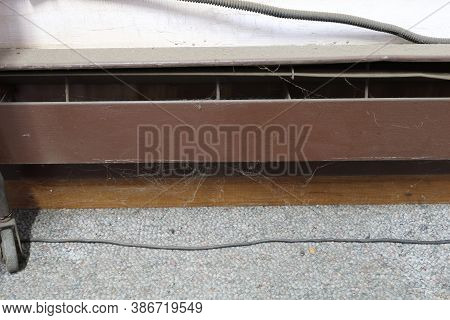 Extremely Dirty Electric Baseboard Heater In Need Of Maintenance