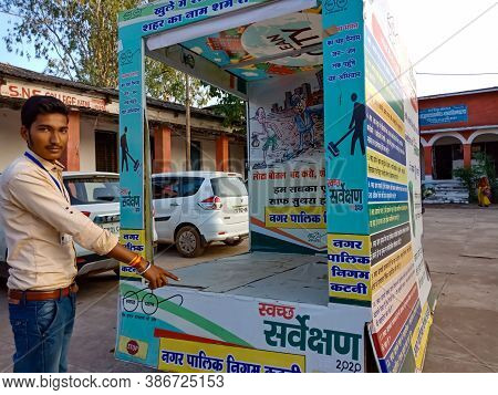 District Katni, India - October 02, 2020: Indian Municipal Corporation Worker Presenting Advertising