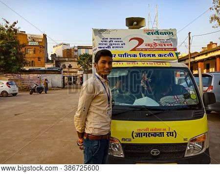 District Katni, India - October 02, 2020: Indian Municipal Corporation Male Staff Stand With Mini Tr