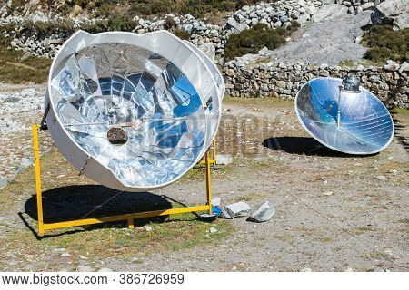 A Solar Cooker Uses The Energy Of The Sun To Cook, Reducing Deforestation In Remote Areas Of Nepal.