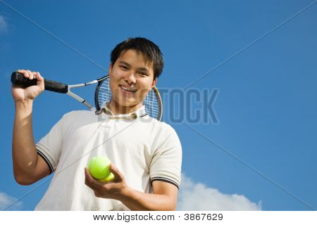 Asijské mužů hraje tenis
