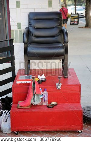 Santa Ana, California / USA - September 23-2020: Shoe Shine Stand. A Shoe Shine Station with a Chair and Cleaning and Shining products outside. Shiny shoes are a sign of fashion. Editorial Use Only.