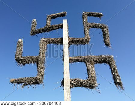Old Lithuania Balt Pagans Symbol Made From Hey In Front Of Blue Sky