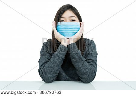 Woman Long Hair Wearing Protective Mask And Propping Up Chin With His Hands