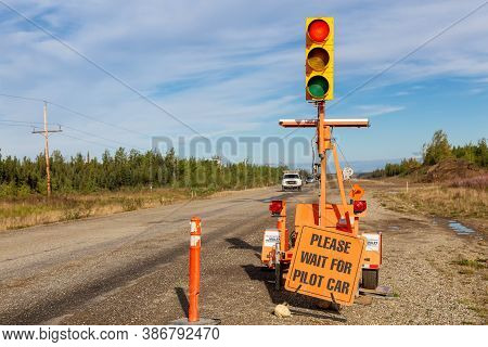 Yukon, Canada - August 27, 2020: Red Light Stop Sign At The Construction Site Working On Road, Klond