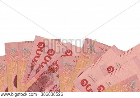 100 Thai Baht Bills Lies On Bottom Side Of Screen Isolated On White Background With Copy Space. Back