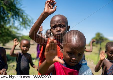 Engare Sero. Tanzania - January 2020: Indigenous Maasai In Traditional Village. Maasailand Is The Ar