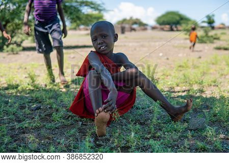 Engare Sero. Tanzania - January 2020: Indigenous Maasai In Traditional Village. Maasailand Is The Ar