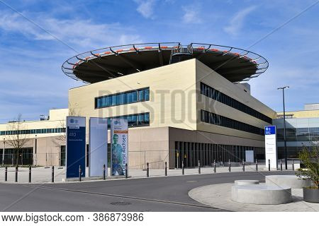 Heidelberg, Germany - February 2020: University Hospital Heidelberg Building With Helicopter Emergen