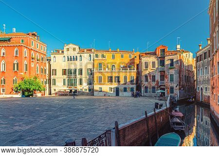 Campo San Anzolo Santangelo Square With Typical Italian Buildings Of Venetian Architecture And Narro