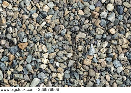 Colorful Small Pebbles. Gravel Texture On The Background. Texture Of Little Rocks. Small Stones, Lit