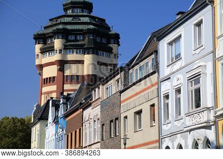 Moenchengladbach City In Germany. Street View With Monumental Water Tower (wasserturm).