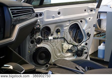 The Inner Lining Has Been Removed From The Door Of A Modern Car. In The Doorway You Can See The Wiri