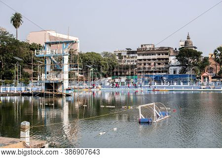 Kolkata, India - February 2, 2020: View Over A Water Park With Diving Tower And A Water Polo Goal Wi
