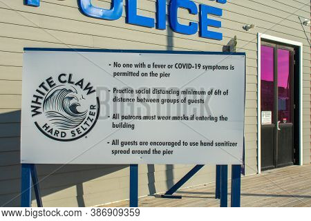 Wildwood, New Jersey - August 8, 2018: A Sign On The Wildwood Boardwalk In Front Of The Police Satio