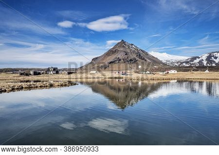 The Mountain Stapafell Reflected In A Pool At Arnarstapi On The Snaefellsnes Peninsula, Iceland.