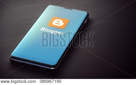Kyiv, Ukraine-june, 2020: Blogger Mobile Application On The Smartphone Screen. Close Up Studio Shot 