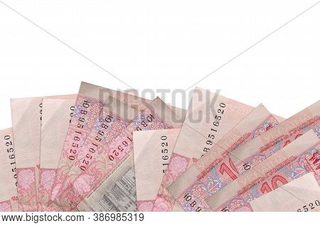 10 Ukrainian Hryvnias Bills Lies On Bottom Side Of Screen Isolated On White Background With Copy Spa