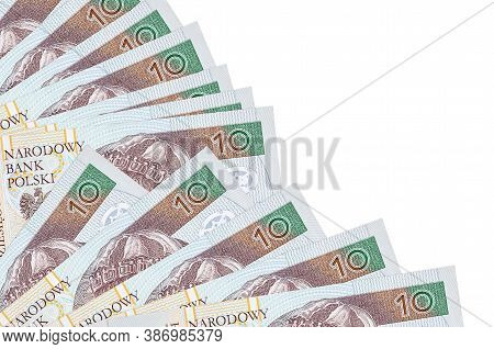 10 Polish Zloty Bills Lies Isolated On White Background With Copy Space Stacked In Fan Close Up
