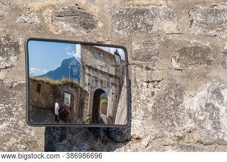Briancon, France - July 7, 2020: A View Of A City Gate In A Traffic Mirror