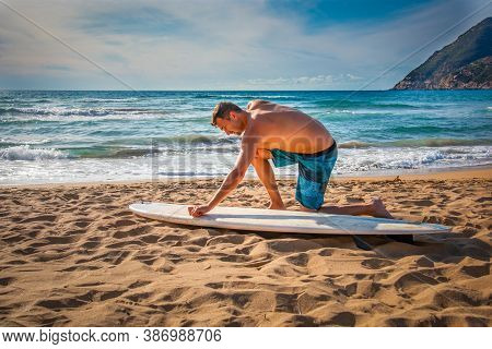 Man Waxing Surfboard Image Photo Free Trial Bigstock