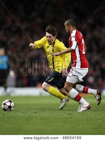 LONDON, ENGLAND. 31/03/2010. Barcelona player Lionel Messi and Arsenal player Gael Clichy during the  UEFA Champions League quarter-final between Arsenal and Barcelona at the Emirates Stadium