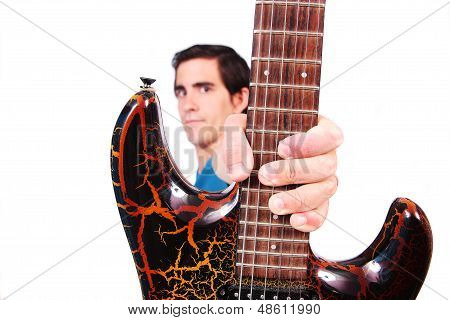 A Male Guitarrist In Action