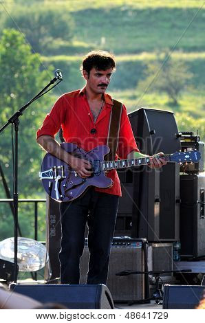 Rock band performs live on the stage