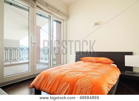 interiérové luxusní apartmán, ložnice s postelí 