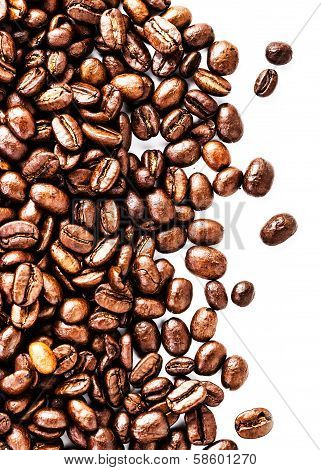 Brown Roasted Coffee Beans Isolated On White Background.  Arabic Roasting Coffee Ingredient Of Hot B