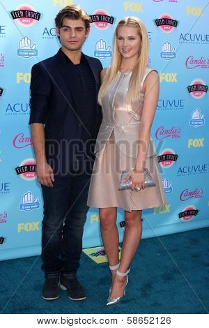 Garrett Clayton and Claudia Lee at the 2013 Teen Choice Awards Arrivals, Gibson Amphitheatre, Universal City, CA 08-11-13
